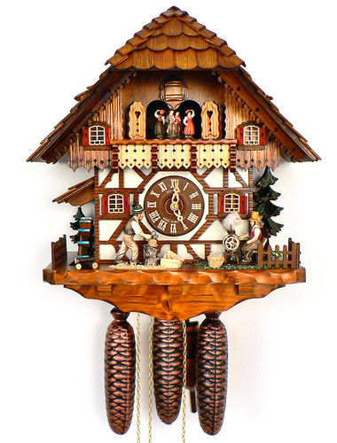 Cuckoo clock with wood chopper and weaving wife