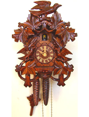 Cuckoo clock with deep carving